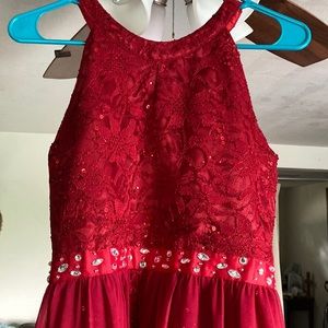 Girls size 16 romper dress with embellishments.